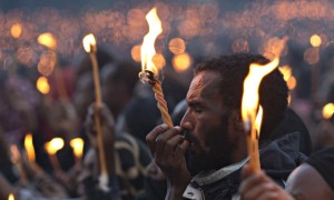 Ethiopian man with candle